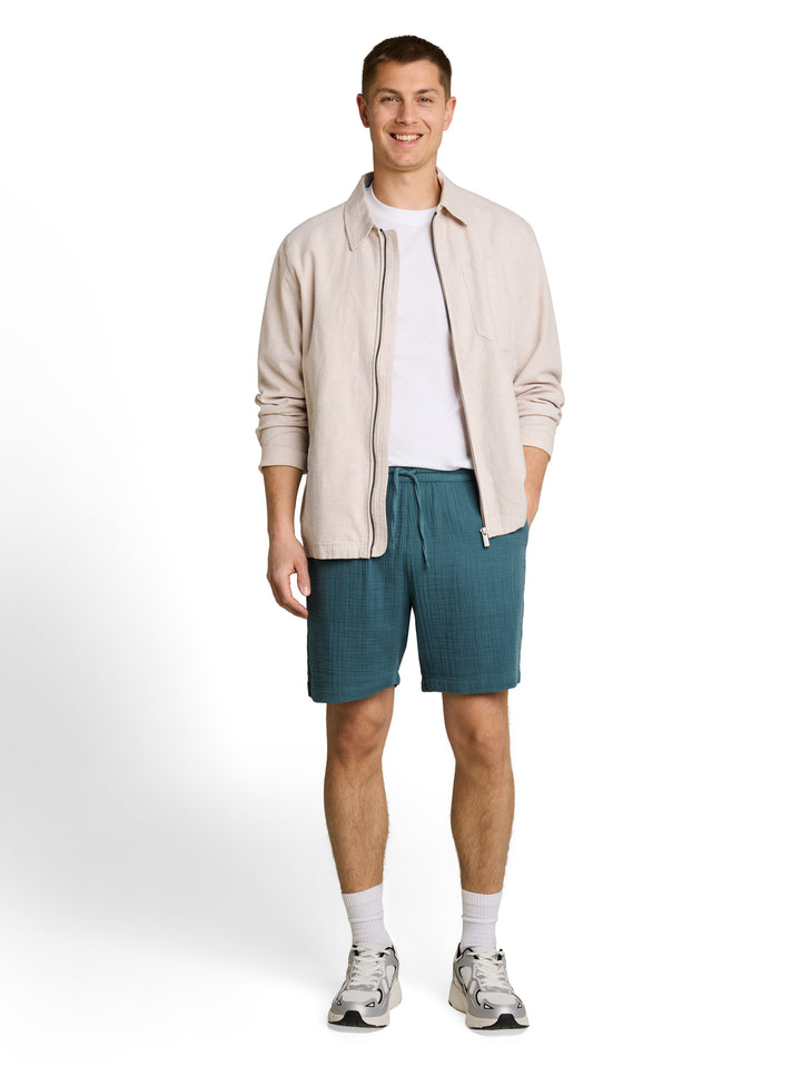 RELAXED MUSSELIN SHORTS
